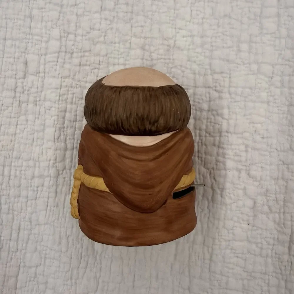 Wind-Up Ziggy Cartoon Figurine Smiling Padre Holding Dog Ceramic/Wood Brown